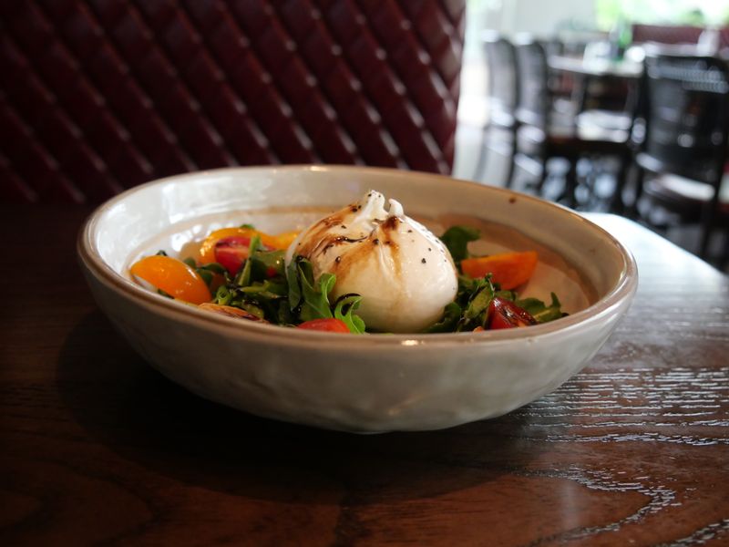 Burrata with heirloom tomatoes at Pizzana